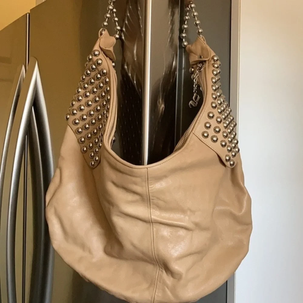 G series camel faux leather hobo purse with large silver decorative studs